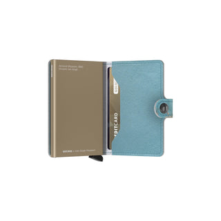 Secrid Miniwallet Art in blue Italian calf leather with embossed cardholder, open view showing interior design