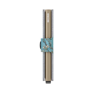 Secrid Miniwallet Art slim wallet with beige leather and turquoise floral strap detail by SECRID
