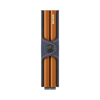 Secrid Twinwallet Matte in navy blue leather with copper aluminum card protector and button closure