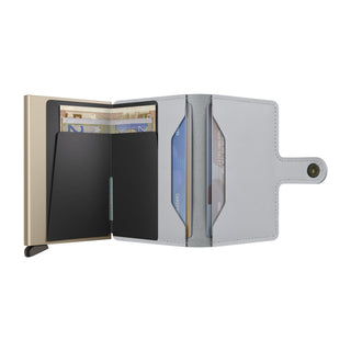 Secrid Miniwallet Art open showing light gray Italian calf leather and card slots with banknotes inside
