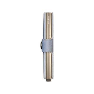 Secrid Miniwallet Art in light blue Italian calf leather with slim metallic card protector and snap closure