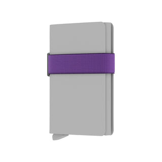 Secrid Additional Band in purple elastic securing a grey compact wallet with textured steel detail