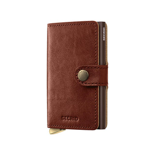 Secrid Miniwallet Basco in brown vegetable-tanned Italian leather with metal card protector visible