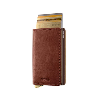 Secrid Slimwallet Basco in brown vegetable-tanned leather showing multiple cards extended from cardholder mechanism