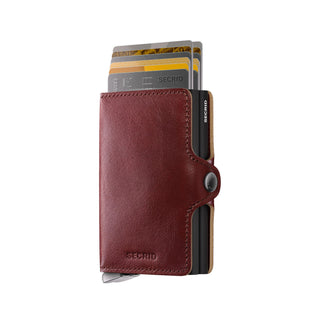 Secrid Twinwallet Basco in smooth burgundy vegetable-tanned leather with card slots partially extended