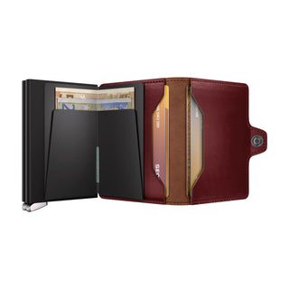 Secrid Twinwallet Basco with burgundy vegetable-tanned leather and black cardholder open flat with cards visible