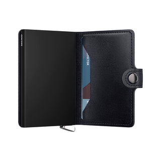 Secrid Miniwallet Basco black Italian leather wallet open showing card slot and metal casing