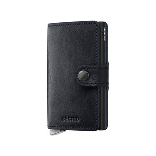 Secrid Miniwallet Basco in smooth navy vegetable-tanned leather with snap closure and embossed logo