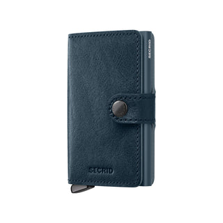 Secrid Miniwallet Basco in navy vegetable-tanned Italian leather with snap closure and embossed logo