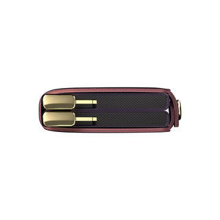 Secrid Twinwallet Basco showing burgundy leather edges with gold metal clasp and textured black card compartments