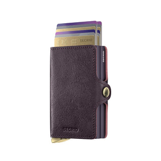 Secrid Twinwallet Basco in dark brown vegetable-tanned leather with cards partially ejected