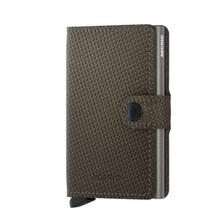 Secrid Miniwallet Carbon with textured carbon fiber design and secure snap closure in dark gray tone