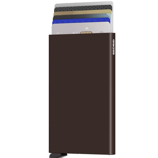 Secrid Cardprotector in dark brown anodized aluminum holding multiple credit cards partially visible