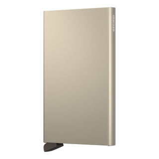 Secrid Cardprotector in anodised aluminum with smooth matte gold finish and branded edge detail