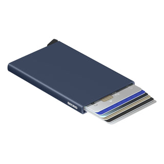 Secrid Cardprotector in navy blue anodised aluminum with cards partially ejected showing card capacity