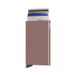 Secrid Cardprotector in anodised aluminium showing multiple cards partially ejected from the rose gold case