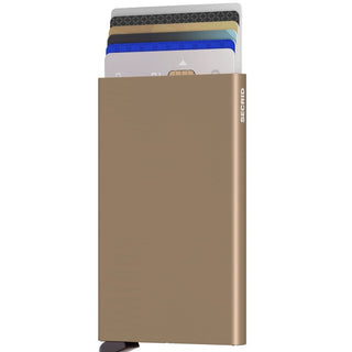 Secrid Cardprotector in bronze anodised aluminum with cards partially extended from the compact wallet case