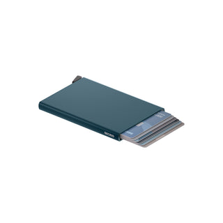 Secrid Cardprotector in blue anodized aluminum partially open with multiple cards fanned out