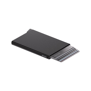 Secrid Cardprotector Fluted black anodised aluminium cardholder with ribbed texture and cards partially ejected