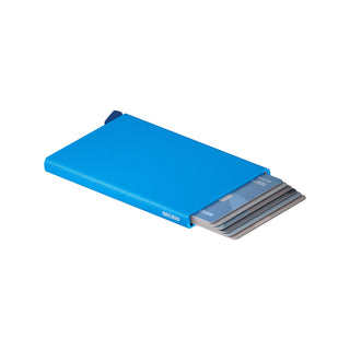 Secrid Cardprotector Powder in vibrant blue anodised aluminium showing card ejection from side angle