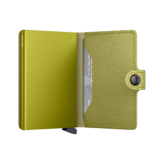 Secrid Miniwallet Crisple with textured lime green European cowhide and black snap button closure open view
