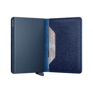 Secrid Slimwallet Crisple open showing textured blue European cowhide and card slot with card partially visible