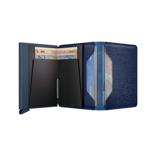 Secrid Slimwallet Crisple in blue European cowhide with cards and banknotes visible inside
