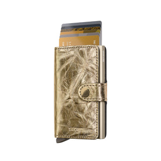 Secrid Miniwallet Crunch in metallic gold European cowhide leather with cards partially ejected