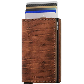 Secrid Slimwallet Dutch Martin in brown European cowhide leather with cards partially ejected