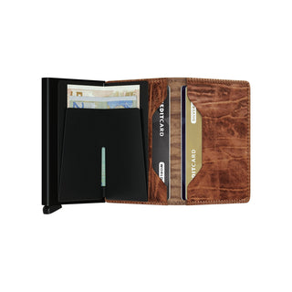 Secrid Slimwallet Dutch Martin with textured brown cowhide leather and black card protector open showing cards and banknotes
