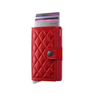 Secrid Miniwallet Emboss Diamond red leather wallet with diamond embossed pattern and cards partially visible