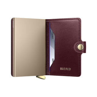 Secrid Miniwallet Emboss Diamond in burgundy sheep leather with metallic cardholder and snap closure