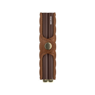 Secrid Twinwallet Emboss Lines in brown leather with embossed details and metallic button closure by SECRID