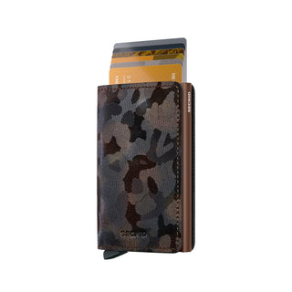 Secrid Slimwallet Jungle with textured cowhide leather in dark camouflage pattern, partially open with cards visible
