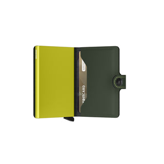 Secrid Miniwallet Matte open showing olive green leather exterior and yellow metal card protector inside