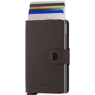 Secrid Miniwallet Matte in brown European cowhide leather with cards partially extended and snap closure