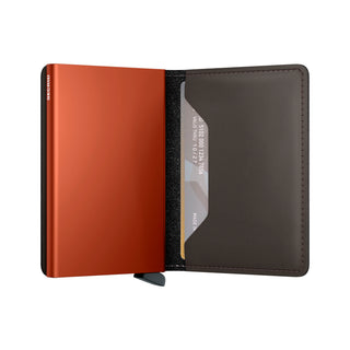 Secrid Slimwallet Matte with orange aluminum case and black European cowhide leather interior open showing card slot