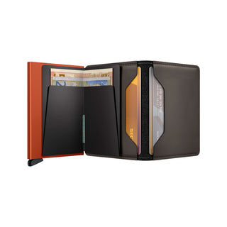 Secrid Slimwallet Matte open showing brown leather and black card compartments with cash inside