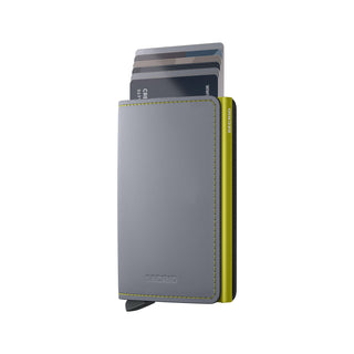 Secrid Slimwallet Matte with grey European cowhide and lime green card protector partially open showing cards