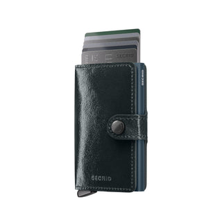 Secrid Miniwallet Naplak in glossy black European cowhide leather with cards partially ejected and secure snap closure