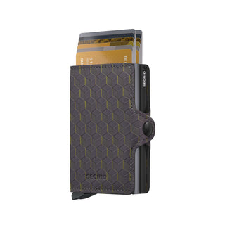 Secrid Twinwallet Optical in dark patterned European cowhide with cards fanned out and compact design