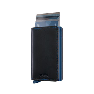 Secrid Slimwallet Original in black European cowhide leather with blue stitching and card ejection mechanism