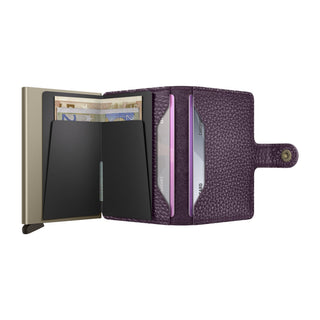 Secrid Miniwallet Pebble open with textured purple cowhide and banknotes inside compact cardholder
