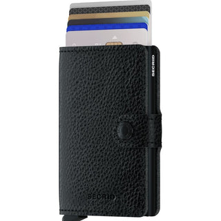 Secrid Miniwallet Veg in black European cowhide with multiple cards partially visible and snap closure