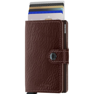 Secrid Miniwallet Veg in brown European cowhide leather with cards partially extended and snap closure