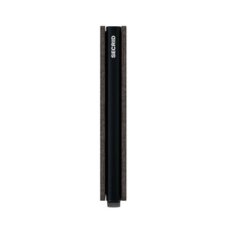 Secrid Slimwallet Veg in black leather showing slim profile and embossed SECRID logo on side