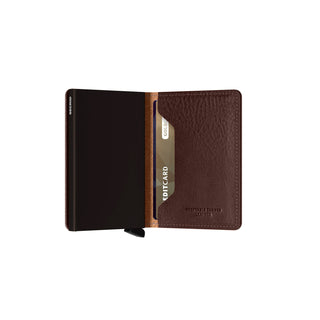 Secrid Slimwallet Veg in brown European cowhide leather with embossed texture and card partially visible