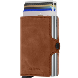 Secrid Twinwallet Vintage brown European cowhide wallet with cards partially ejected and aluminum card protector