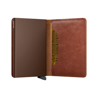 Secrid Slimwallet Vintage opened showing brown European cowhide leather and embossed card holder mechanism
