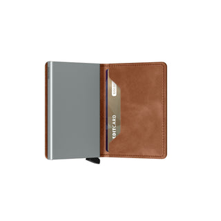 Secrid Slimwallet Vintage open showing smooth brown leather and compact metal card protector with card slot